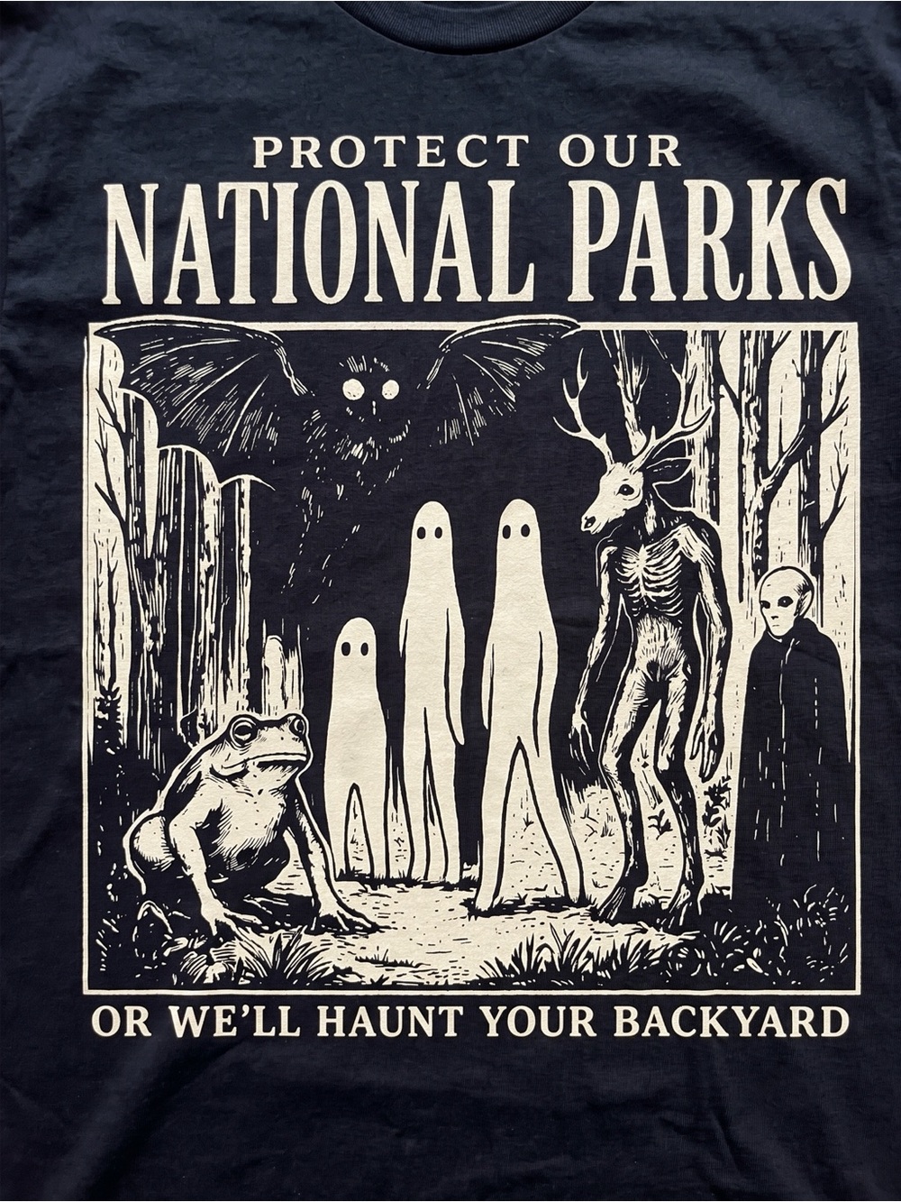 Protect Our National Parks Cryptid Haunt Your Backyard Parody Black T-Shirt - Picture 2 of 2